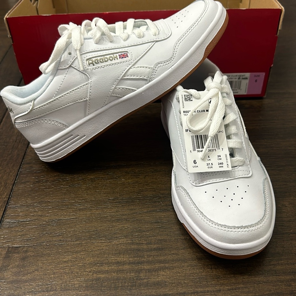 NWT and in a box. Unisex Reebok sneaker size 6. Color is white